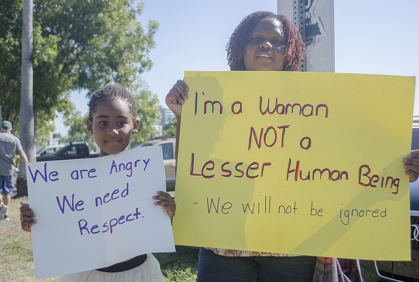 Starlla Jackson and Mandy Jackson prepare to walk in the Women’s Solidarity March.