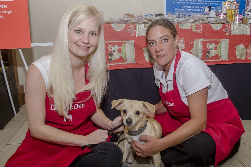 Kristy Howland and Casey Williamson pose with Henry.