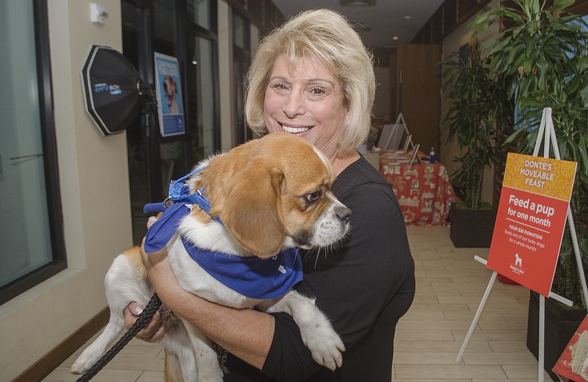 Donte’s Den founder Marsha Panuce poses with her dog Blake.