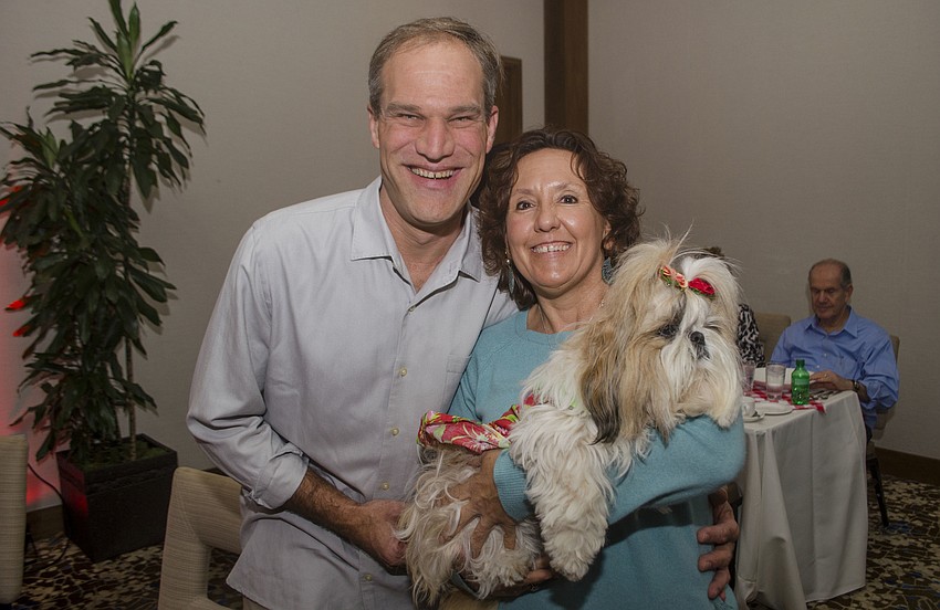 Judy Dempsey and David Nau pose with Patches.