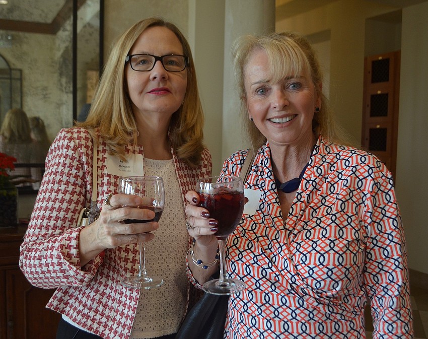 Lynn McNamee and Cathi Thomaides, both members of The Lake Club TLC, enjoy the special event.