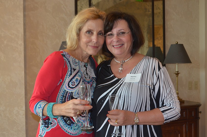 Lakewood Ranch'  s Diane Vendette and Martine Moscovita enjoy some champagne.