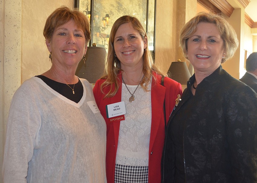 Mary Scharf, Lisa Mead and Stephanie Goforth support the 