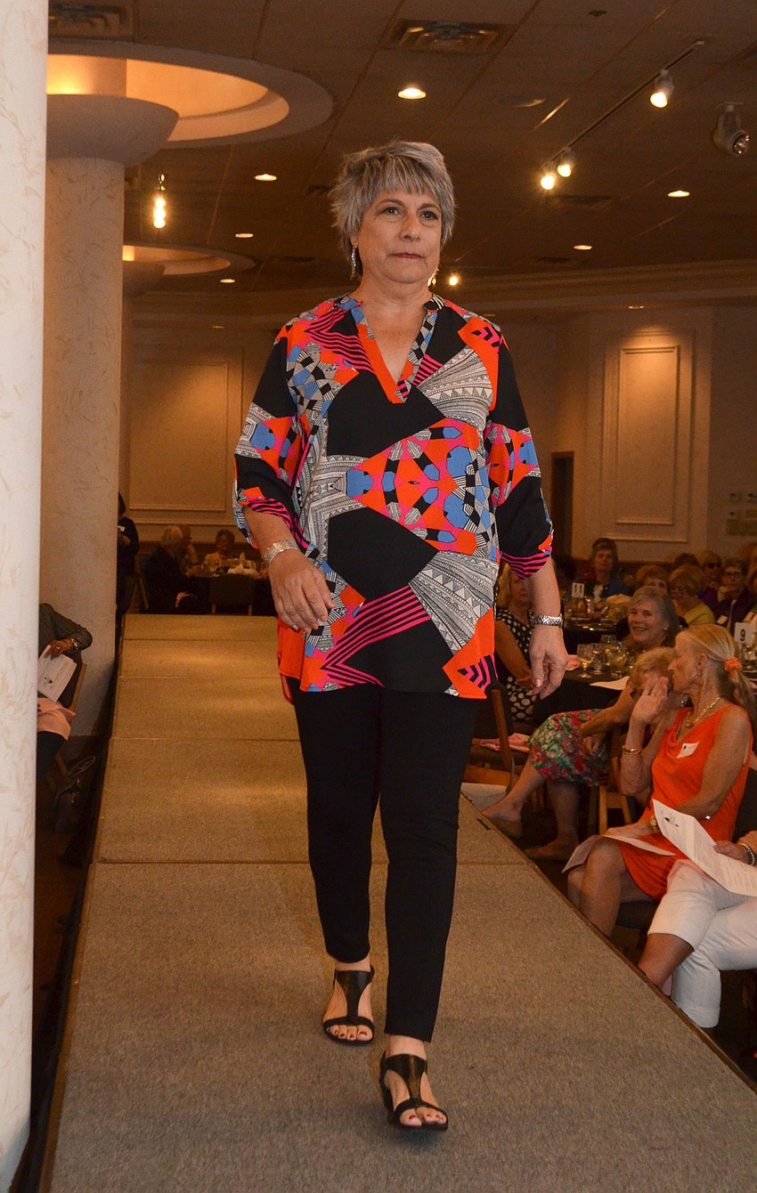 Barbara Somma hits the runway during Passion for Fashion at Michael’s On East on Feb. 8.