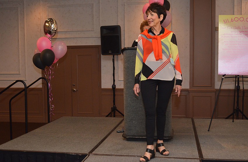 Carol Shabe strikes a pose during Passion for Fashion at Michael’s On East on Feb. 8.