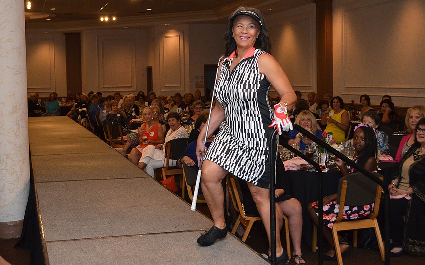 Angelina Wood begins her walk down the runway during Passion for Fashion at Michael’s On East on Feb. 8.