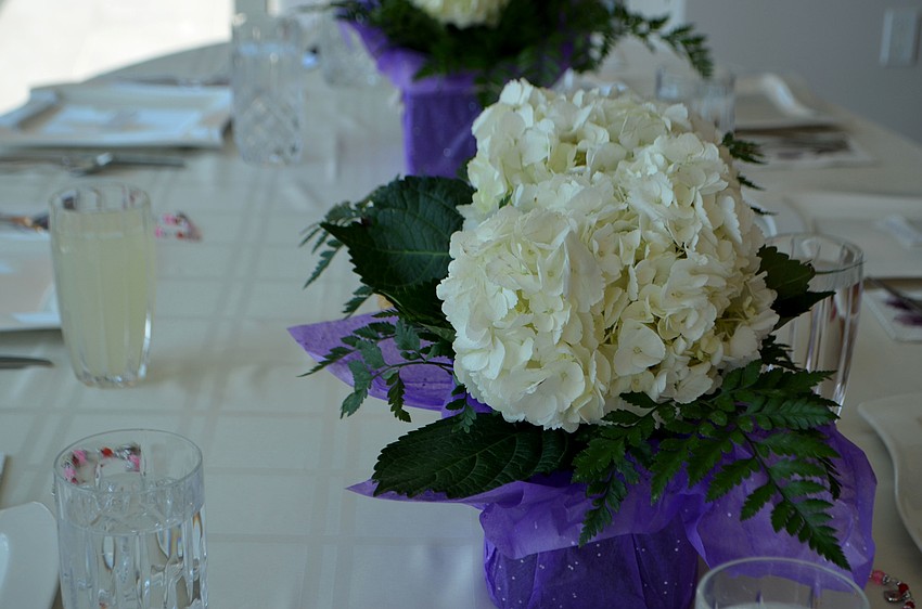 Hydrangeas sat in the center of each table adding simple decorations to the lunch.