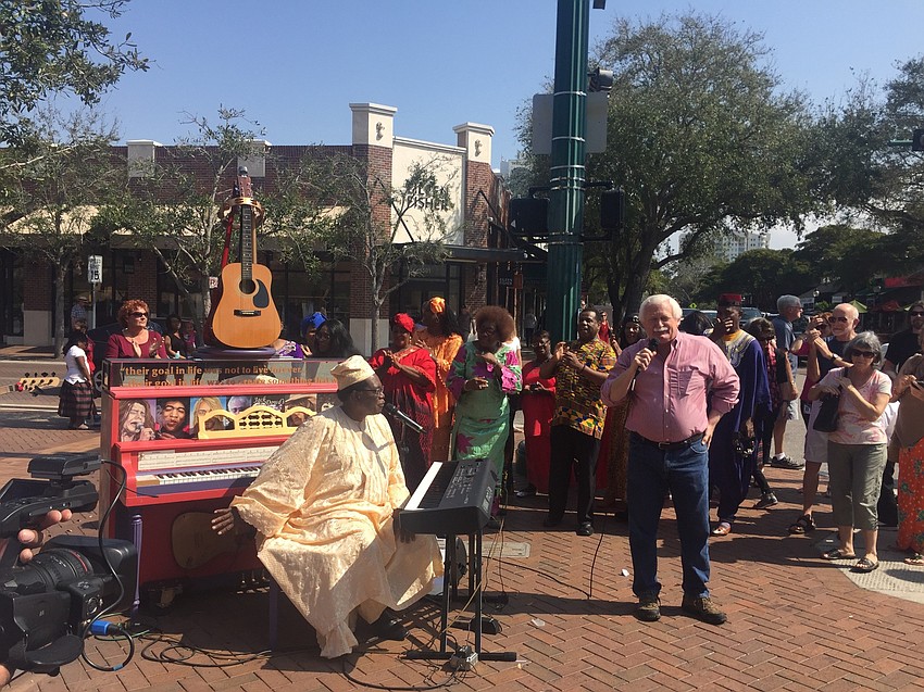 Jim Shirley addresses the crowd at today’s pop-up concert.