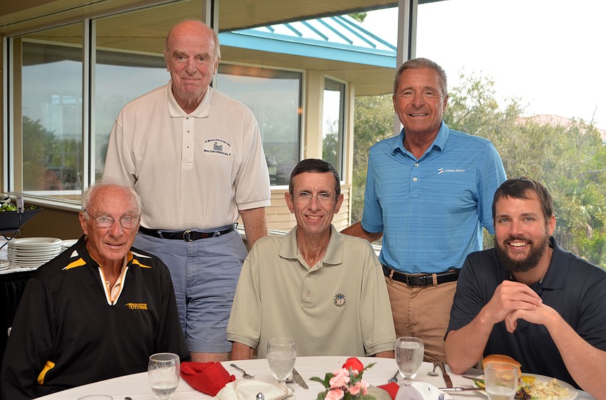 Gus Swoboda, Dick Warren, Mike VandenBusch, the Rev. Eric Scanlan and Tom Thibodeau