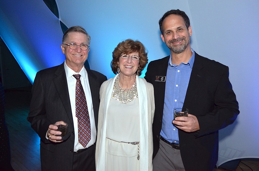 Tim and Caroline Ryan with John Miller
