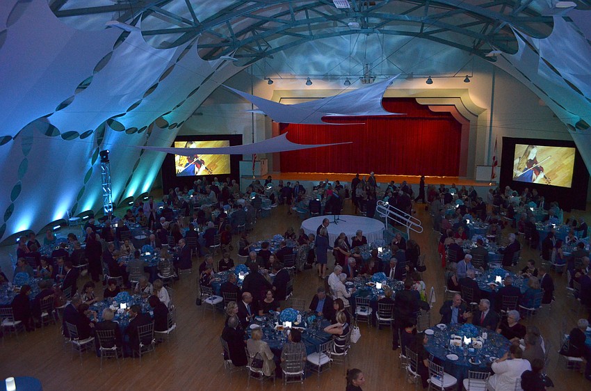 Guests dined under stunning futuristic drapings bathed in ocean-like lights.