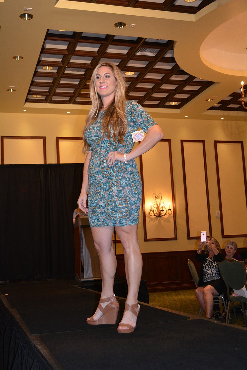 Meals on Wheels PLUS Marketing and Communications Manager Stephanie Grepling models a dress by LuLaRoe.