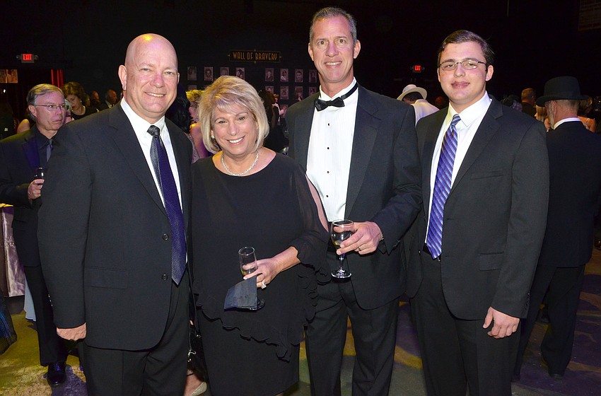 Steve Altier, Marsha Pancue, Dr. Alan Valadie and his son, Mitchell Valadie