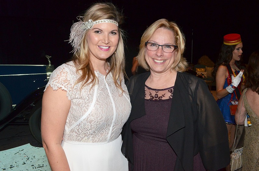 Emily Karr, event organizer, with Lisa Honig