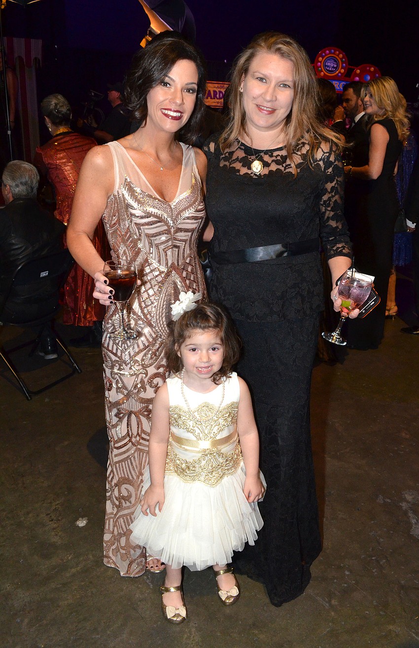 Marissa Lesselroth, her daughter (and cancer survivor) Gianna Lesselroth and Lydia Bailey