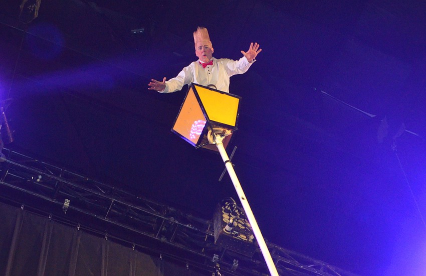 Bello Nock climbs to the top of a pole to “open the curtains” at the Big Top Gala on Feb. 25 at Feld Entertainment Studios.