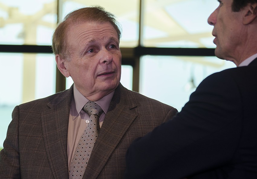 Ringling College of Art and Design President speaks with photographer and climate change advocate James Balog after his lecture.
