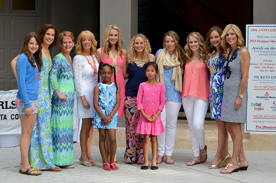 The Lilly Pulitzer High Tea & Champagne Fashion Show models gather for a group photo after the fashion show finale Sunday, Jan. 18.