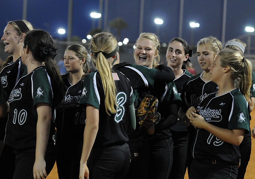 The Lakewood Ranch softball team celebrates following its 2-0 victory over Countryside in the Class 7A-Region 3 quarterfinals April 24.