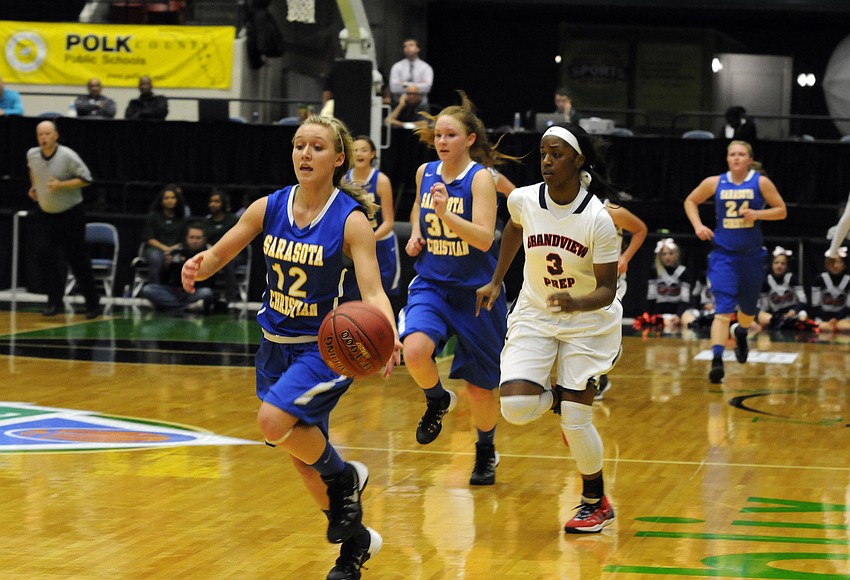 Sarasota Christianâ€™s McKenzie Lantz races down the court on a fast break opportunity.