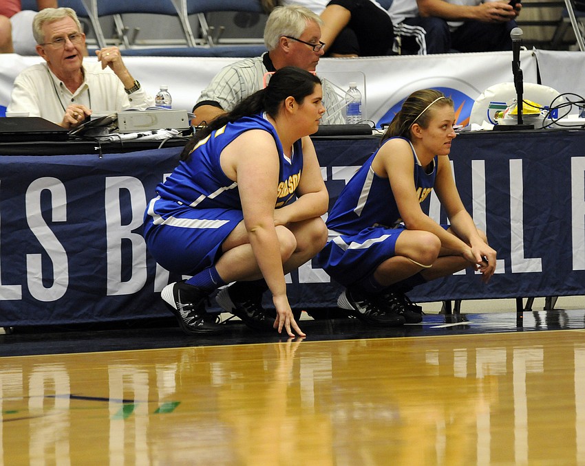 Sarasota Christianâ€™s Kaylynn Snyder and Nicole Miller wait to come into the game in the fourth quarter.
