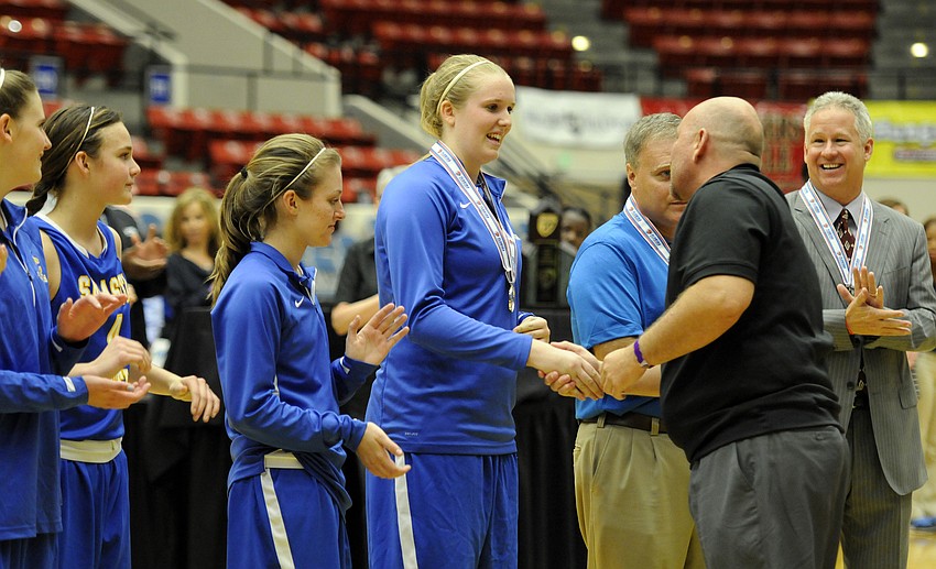 Sarasota Christianâ€™s Anikka Jensen receives her Class 2A state runner-up medal.