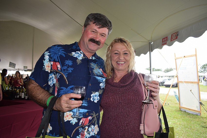Country Creek's Nino Simunovich has been going to the wine fest for years while Largo's Anna Rice attends the festival for a second time. 