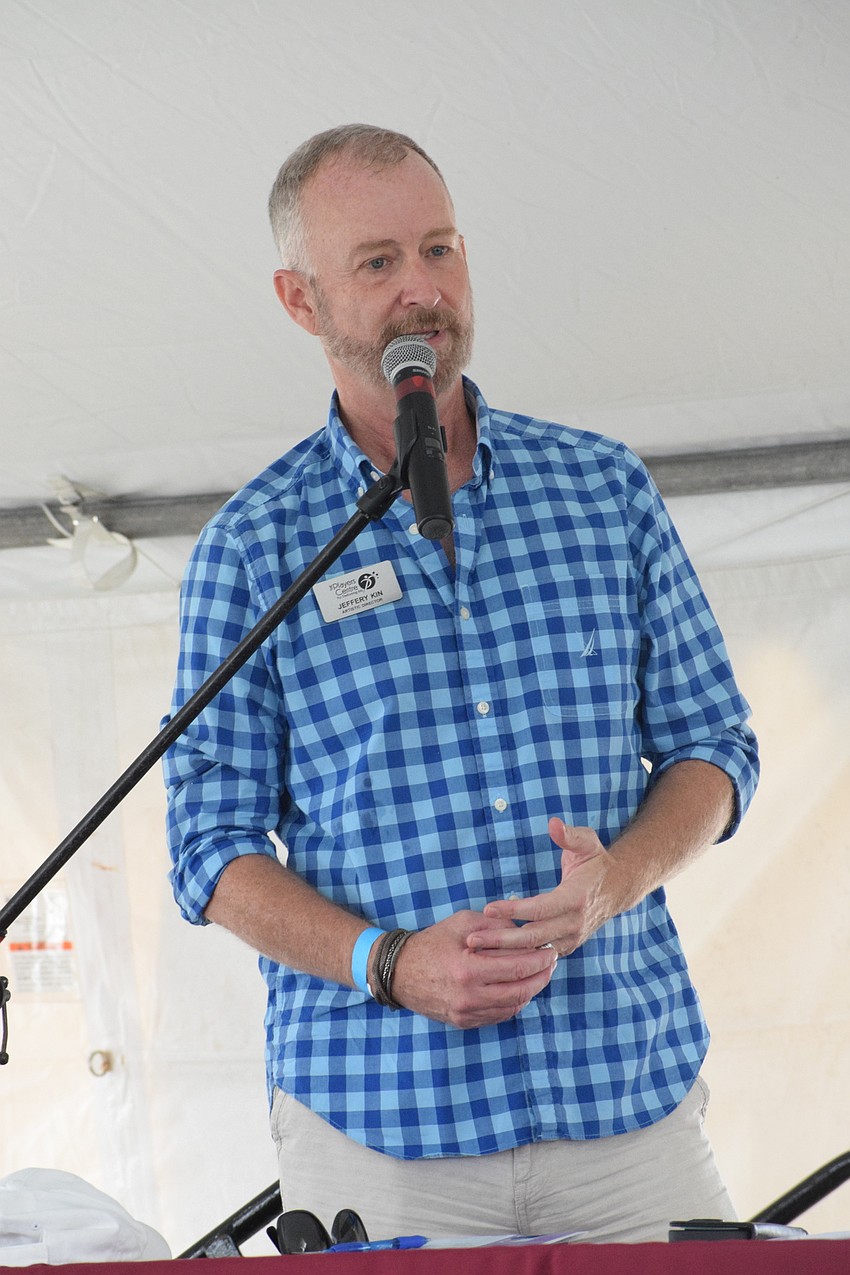 Jeffery Kin with the Players Centre for Performing Arts shares fun food facts before the cooking demonstration begins.