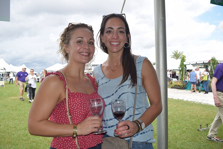Tampa's Elena Montesano and Michelle Allegra attend the Suncoast Food and Wine Fest to be with friends. 