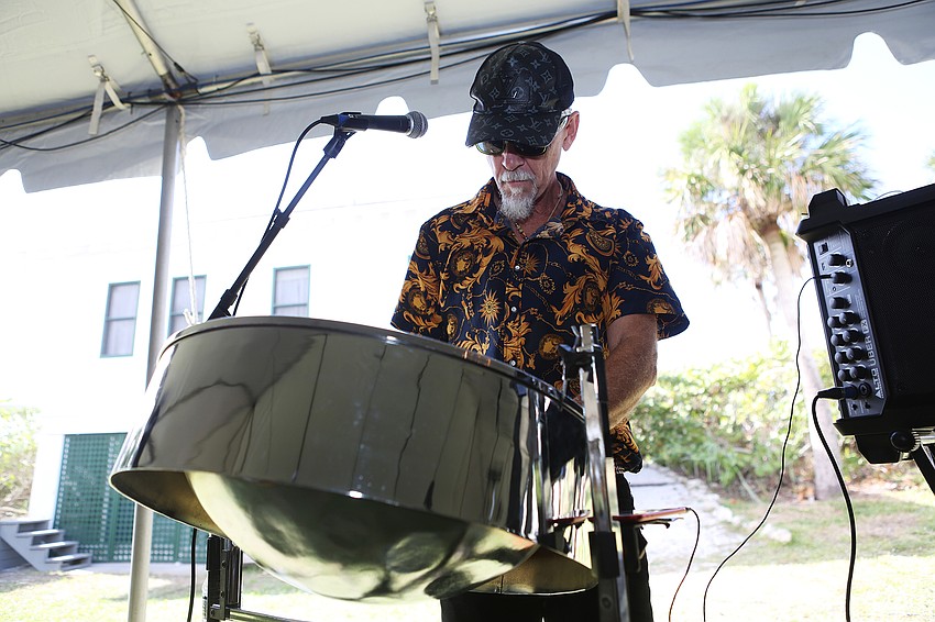 Tom Heiden plays the steel drums.