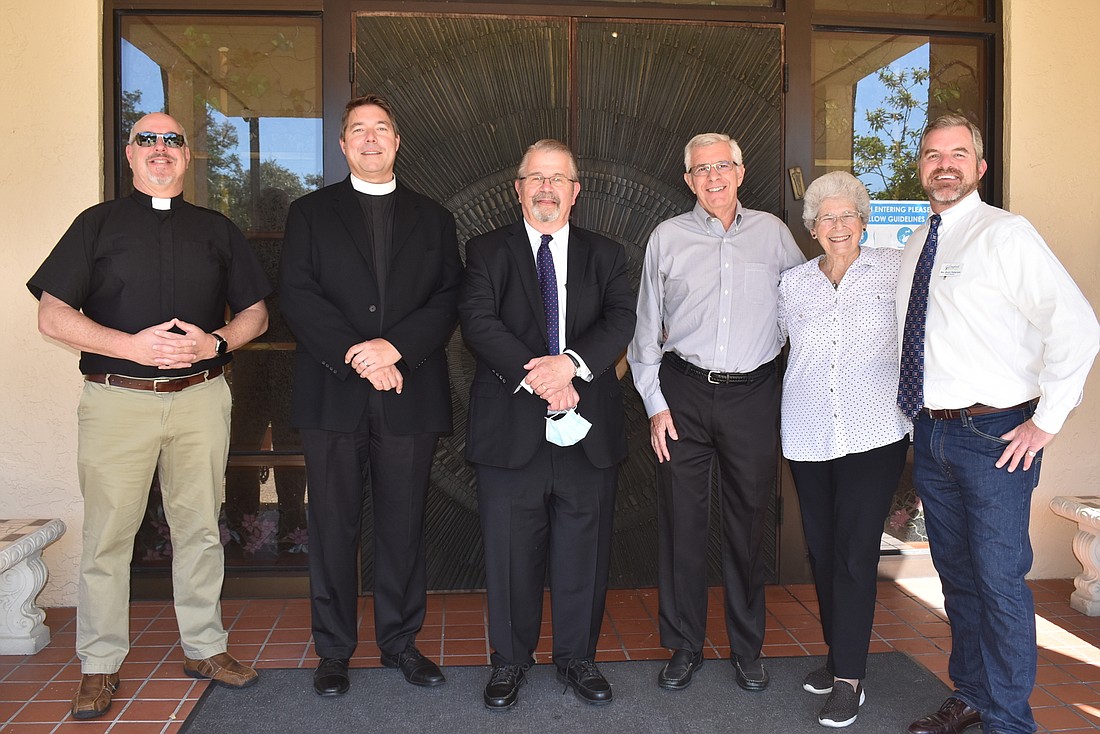 Rev. Ken Blyth from SAKLC, Father Dave Marshall from All Angels, Rabbi Stephen Sniderman from Temple Beth Israel, Rev. Norman Pritchard from CCLBK, MiMi Horwitz and Rev. Brock Patterson from Longboat Island Chapel.