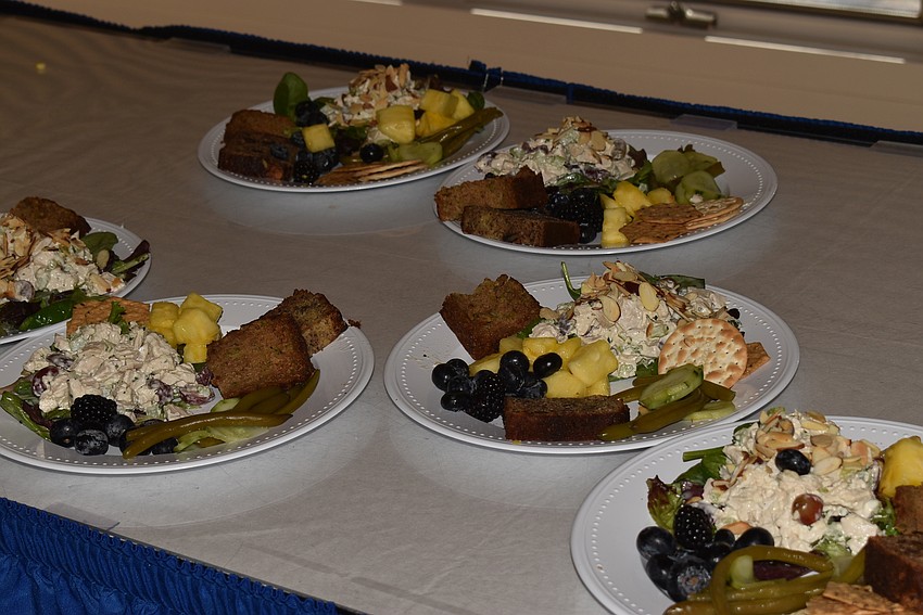 Members picked up the prepared plate that appealed to them.