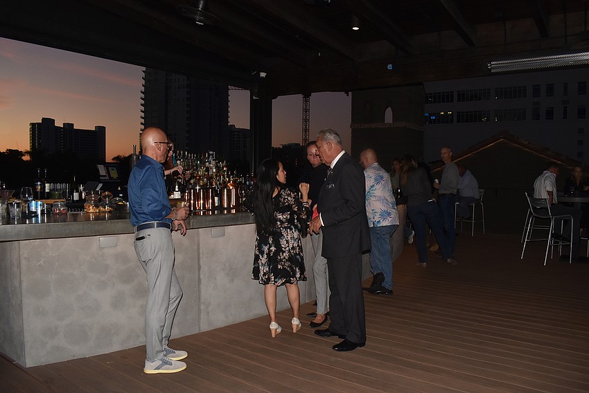 Attendees got drinks at Sage's rooftop bar.