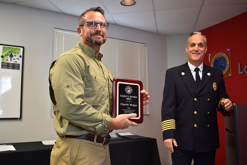 Longboat Key Town Project Manager Charlie Mopps won the 2021 Chief’s Award. Fire Chief Paul Dezzi congratulated Mopps on Wednesday morning.