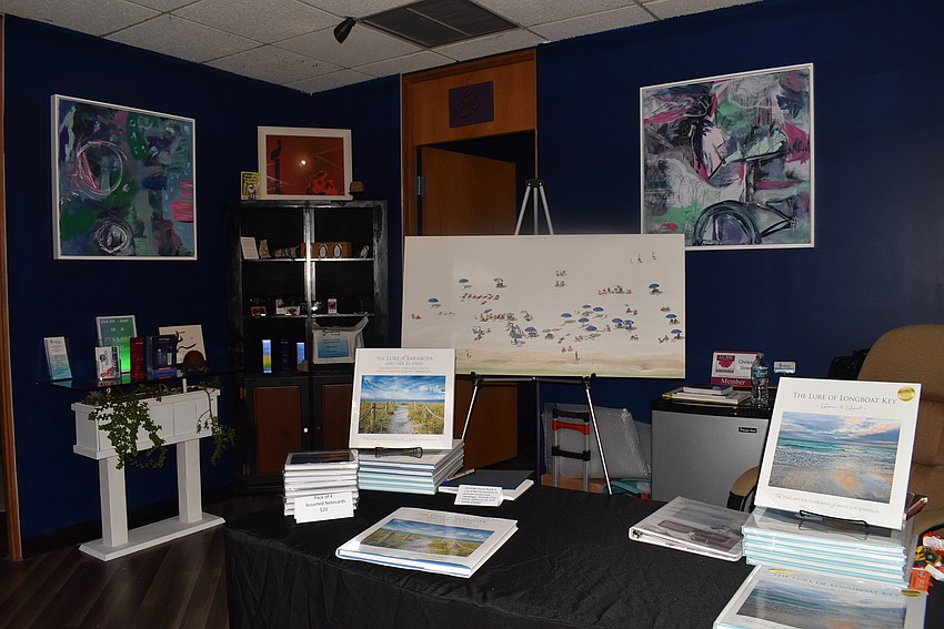 Mary Lou Johnson hosted a book signing at the ribbon cutting.