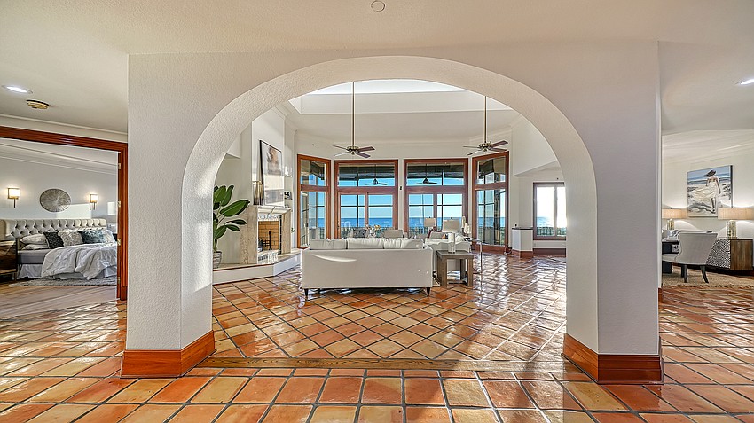 Floor-to-ceiling windows offer views of the beach and Gulf of Mexico from most of the home's 4,988 square feet. (Courtesy Pix360)