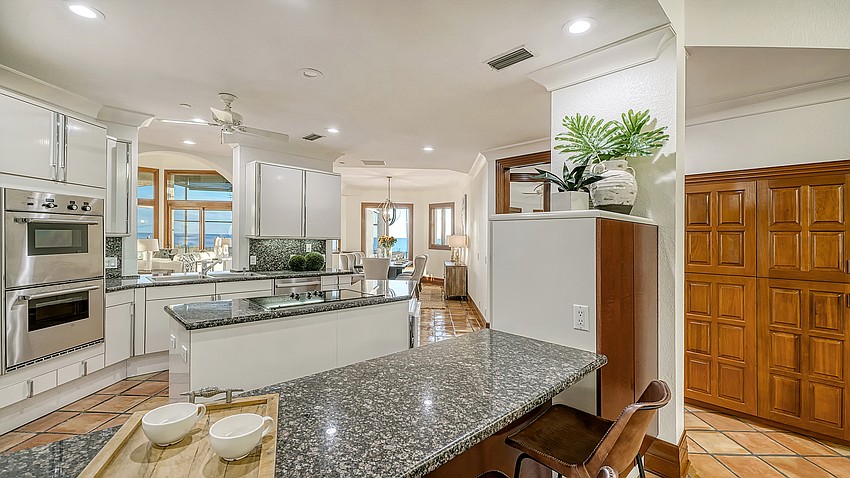 The kitchen is open to the living areas. (Courtesy Pix360)