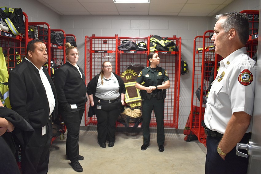 On Thursday, Longboat Key Fire Chief Paul Dezzi (right) gave Sarasota County dispatchers a tour of Fire Station 92.