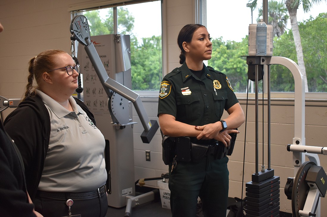 Sarasota County Communications operator Ashley Patrick and Lt. Michelle DiCapua got a tour of Longboat Fire Station's 91 fitness facility in November 2021.