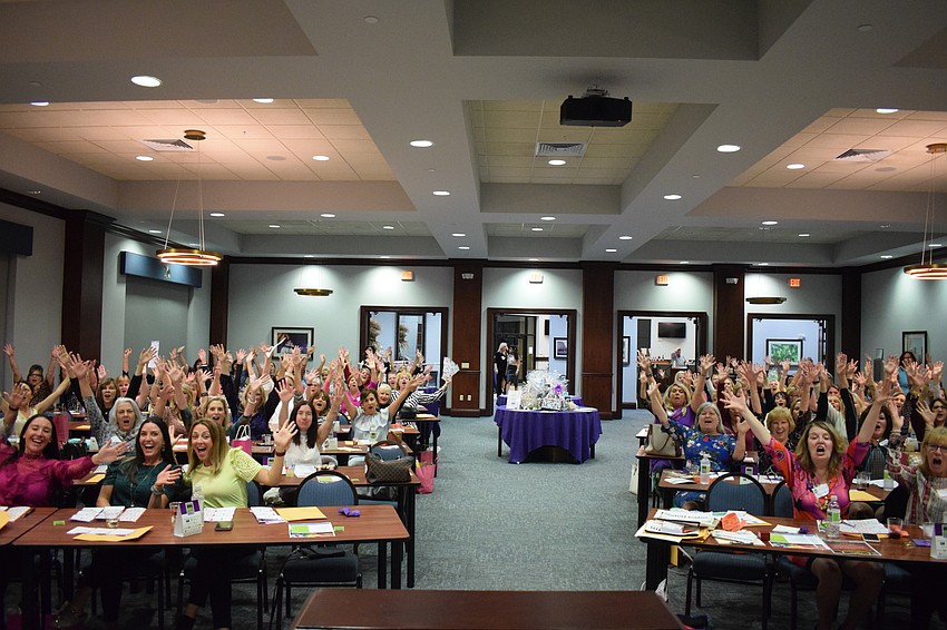 Designer Bag Bingo participants are excited for the first game of bingo.