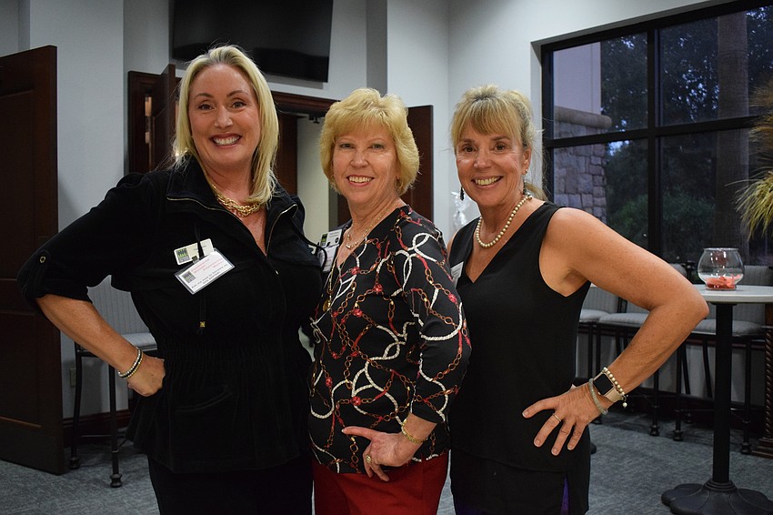 Sisterhood for Good members Tracy Wolfe, Kathy Collums and Roxanne Sima look forward to raising money and signing up new members at Designer Bag Bingo.