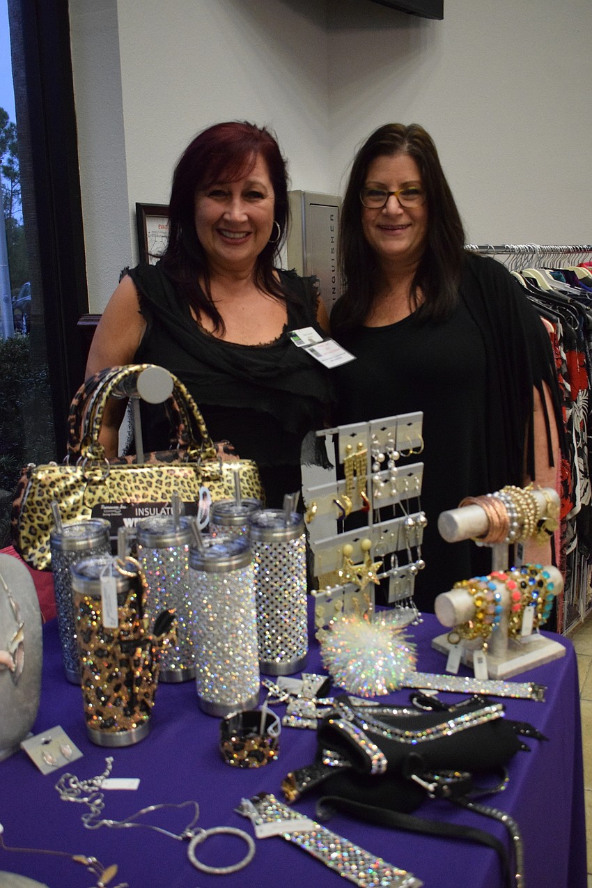 Darci Jacob and Debbie Greb with Darci Boutique in Sarasota showcases some of their products. Jacob says 20% of sales were being donated to Sisterhood for Good.