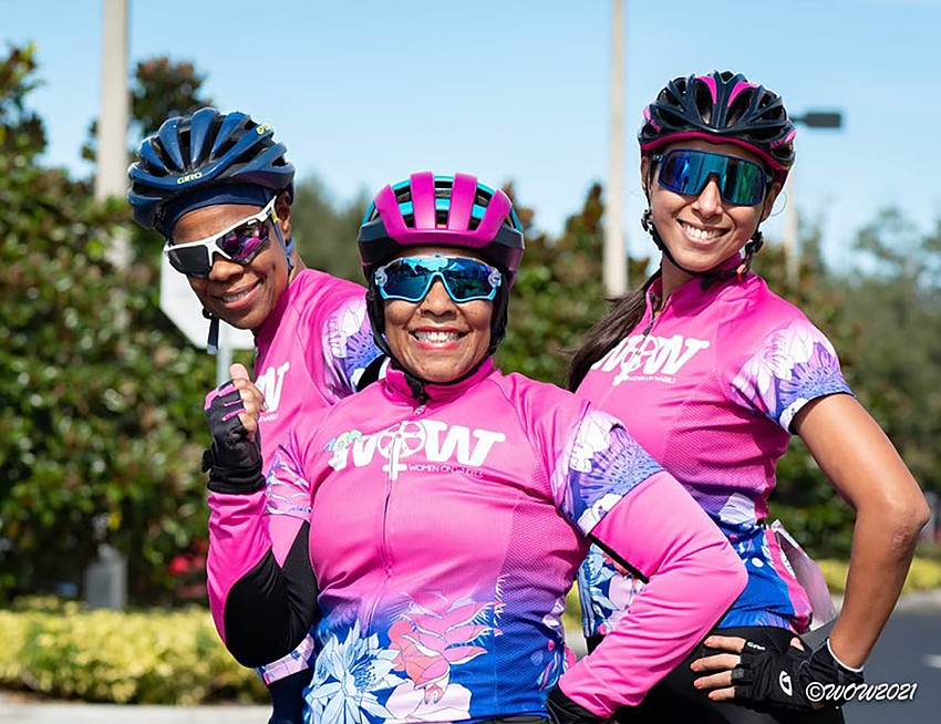 Wesley Chapel's Denise Harrison, New Tampa's Conchita Burpee and Carrollwood's Ana Henriquez have fun during the Women on Wheels charity ride. Courtesy photo.
