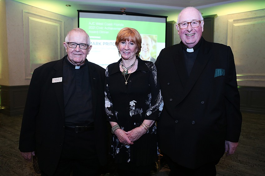 Deacon Pat Macauley, Bridget Spiess and Rev. Russell Wright.