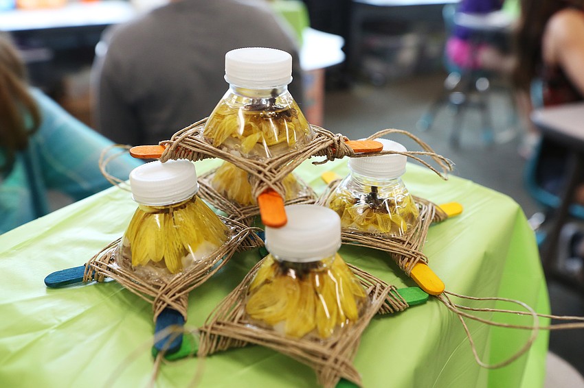 Harloh Leonard created tree decorations out of plastic bottles, flowers and twine.