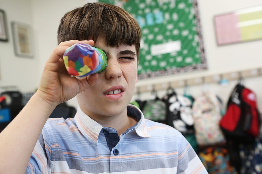 Gavin Johnson demonstrates how to use his kaleidoscopes.