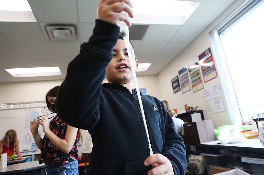 Alex Vazquez stretches his slingshot.