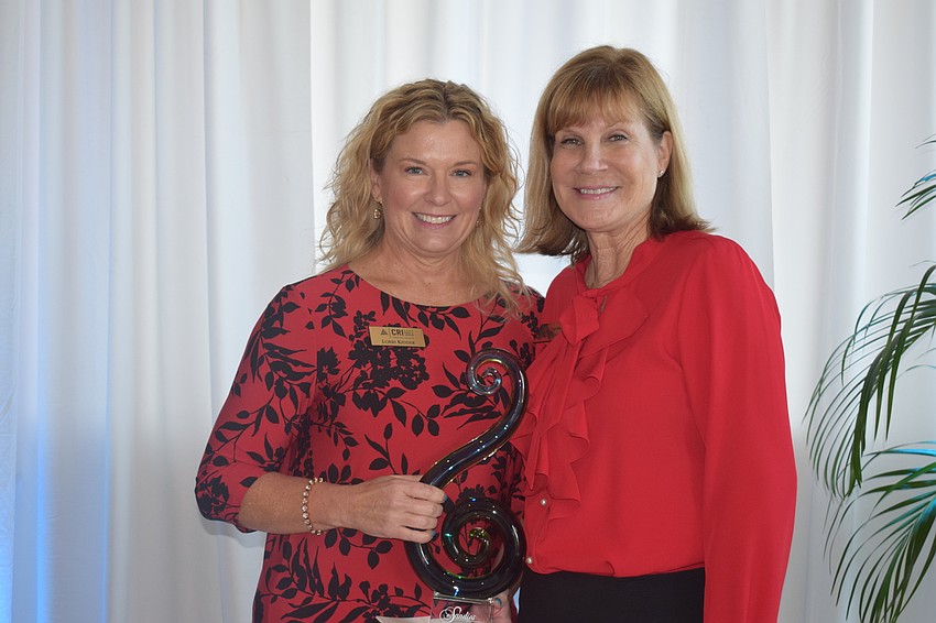 Lorri Kidder of Carr, Riggs and Ingram was presented her Above and Beyond award by Manatee County Commissioner Carol Whitmore.