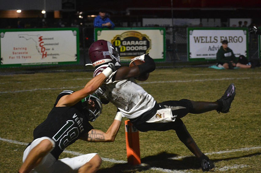 Rams senior Johnell Williams is ripped down on a long run. Williams would score on the next play.