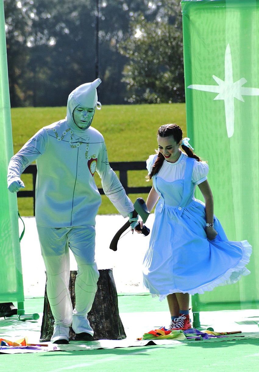 Lakewood Ranch High's Case Wilcox plays the Tin Man and Angel Frazzoni plays Dorothy in the Marching Mustangs' performance.